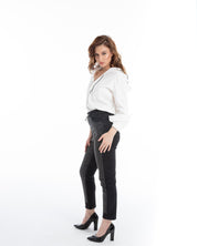Model wearing Women’s Printed Top – Button-Down Long-Sleeve in bold all-over print