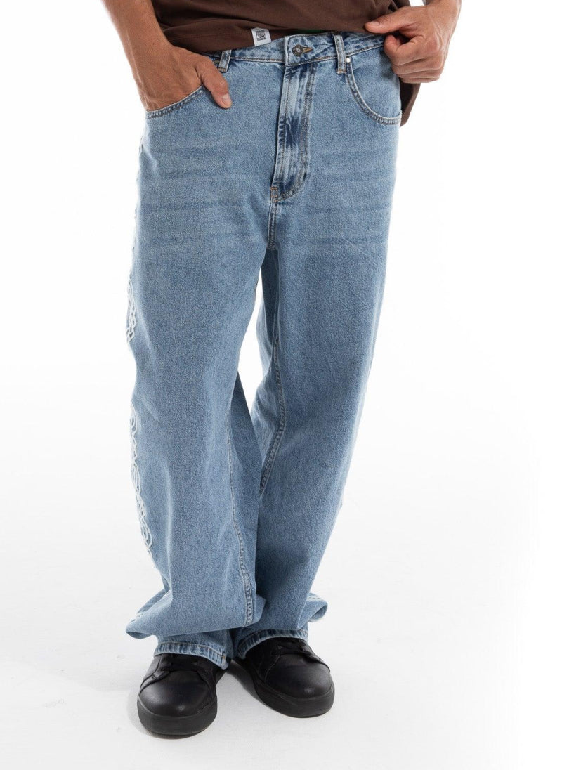 Stitched Elegance: Men's Unique Embroidery Jeans