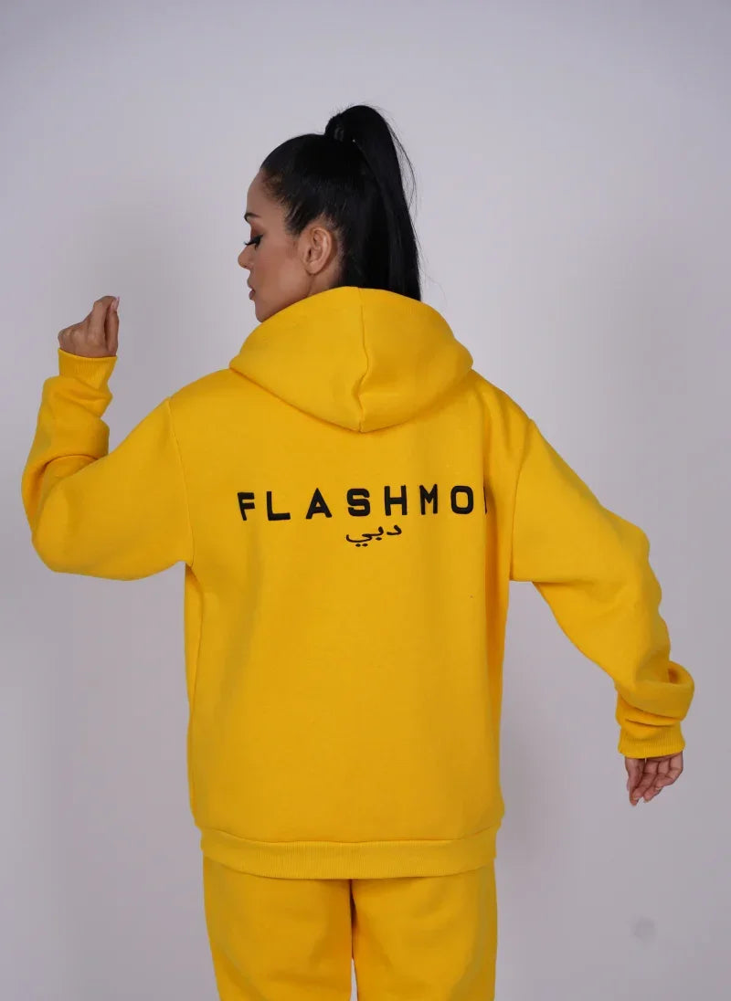 Model wearing Flashmob Nation FM oversized zip hoodie – styled as a streetwear essential 