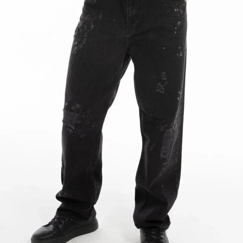 Fashion-forward jeans with unique chain details, offering a modern fit and urban flair.