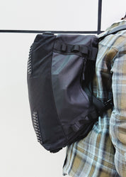 Back view of black travel bag worn as a backpack for women - Flashmob Nation