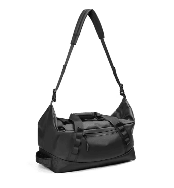Black 3-in-1 convertible duffel bag shown as a crossbody - Flashmob Nation