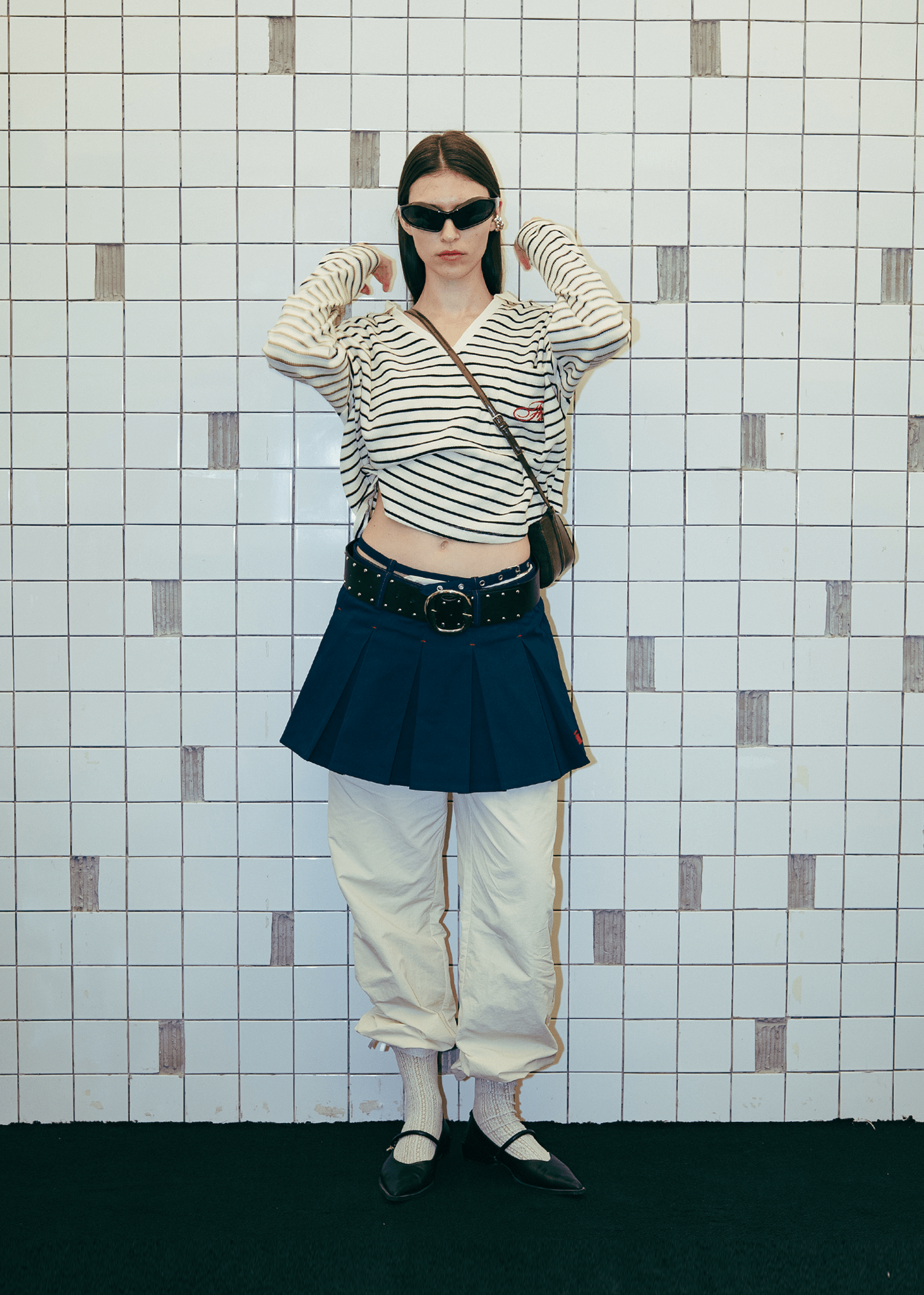 Urban lifestyle look featuring the Clove Pleated Bowling Skirt