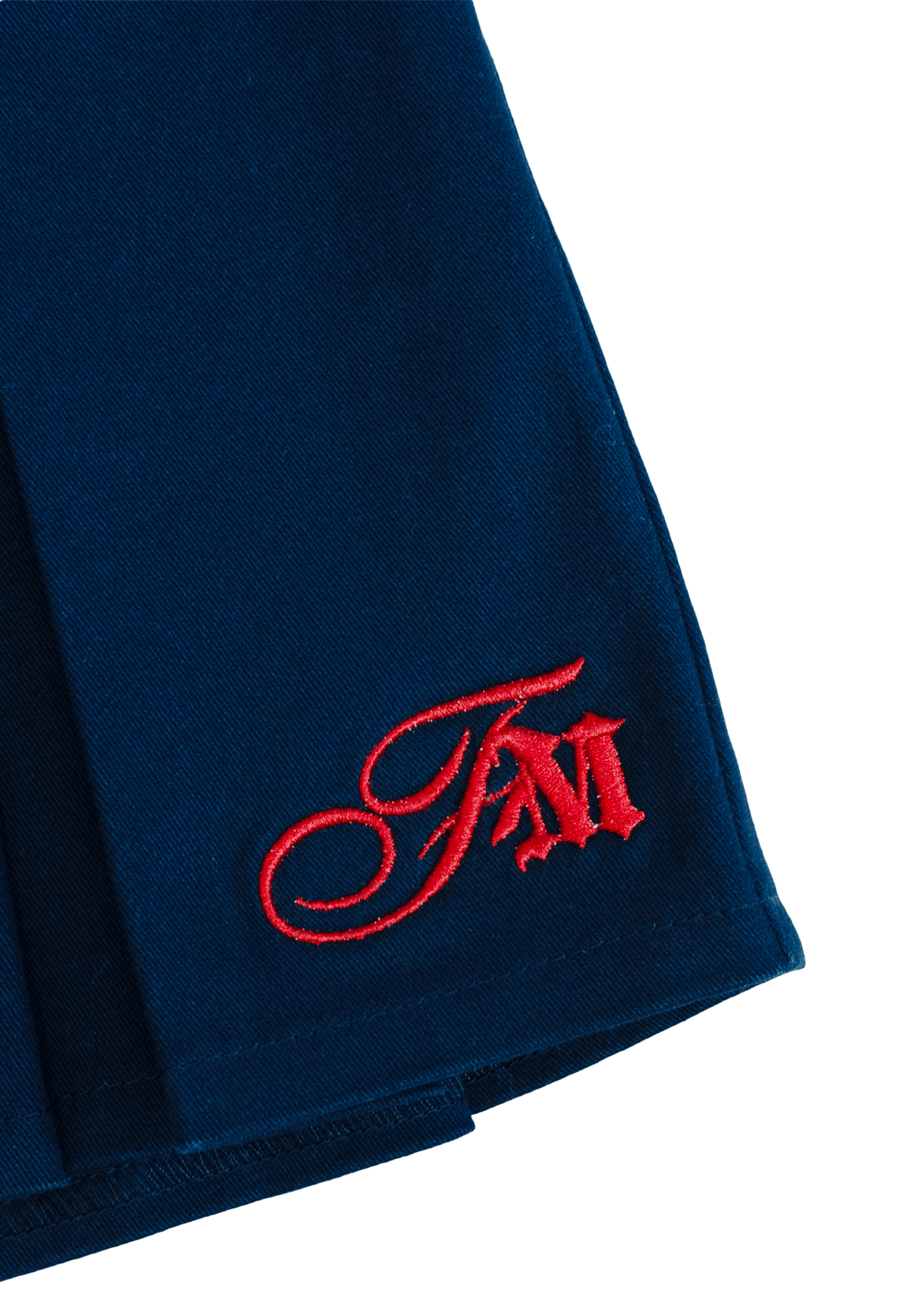 Detail of the FM Embroidery on the Clove Pleated Bowling Skirt