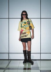 Detailed view of the vibrant high-definition graphic on the yellow Flashmob tee.