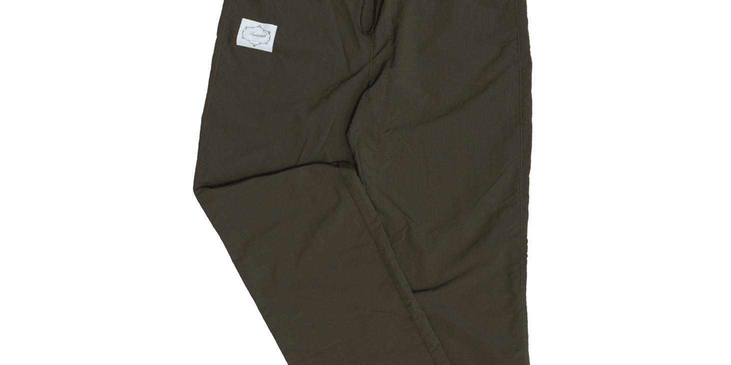 Flat lay view of FM Essentials Nylon Pants in Coffee Bean