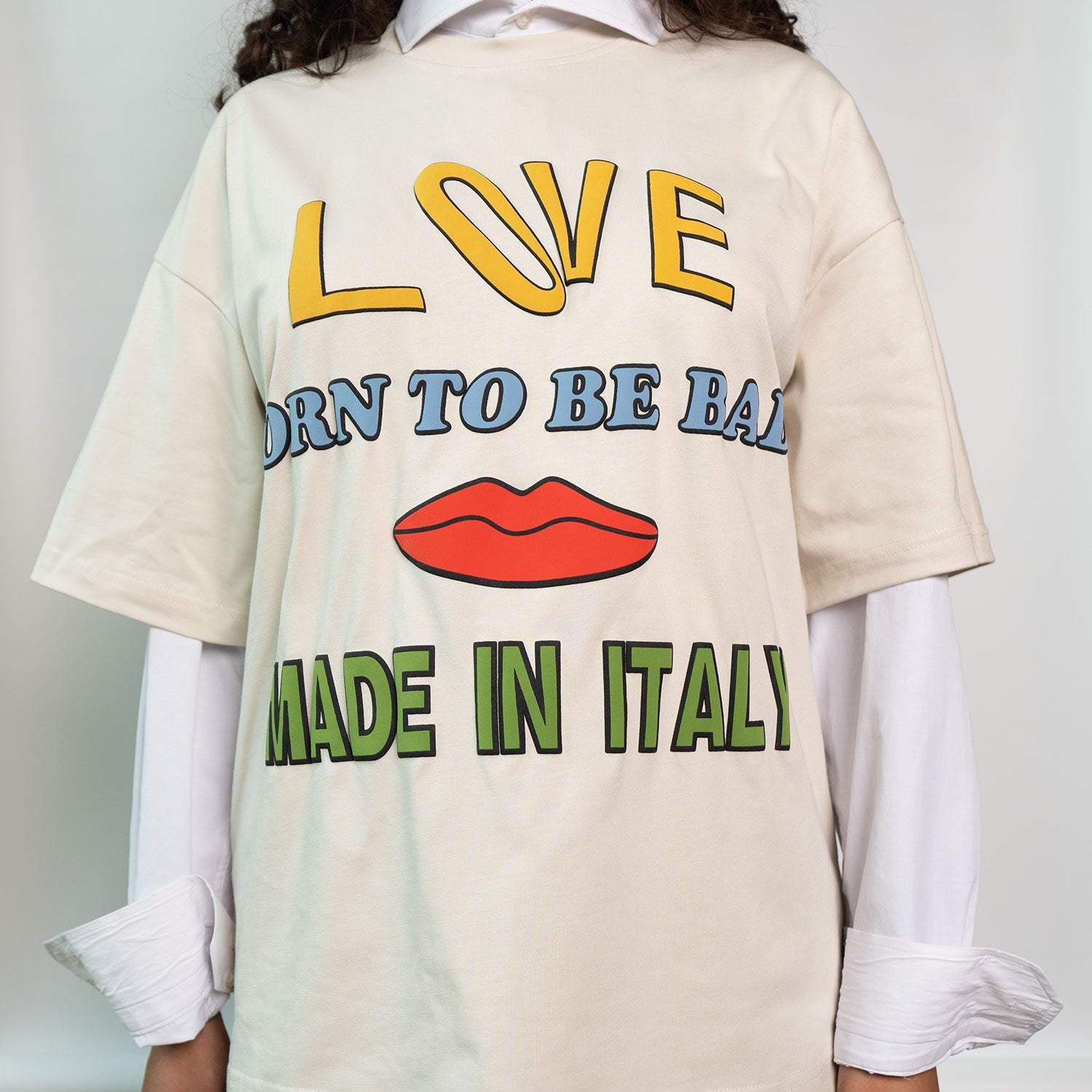 Model wearing Graphic T-Shirt with “Love” print
