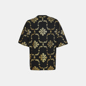 High-visibility glow on the men’s black gold reflective graphic streetwear t-shirt.
