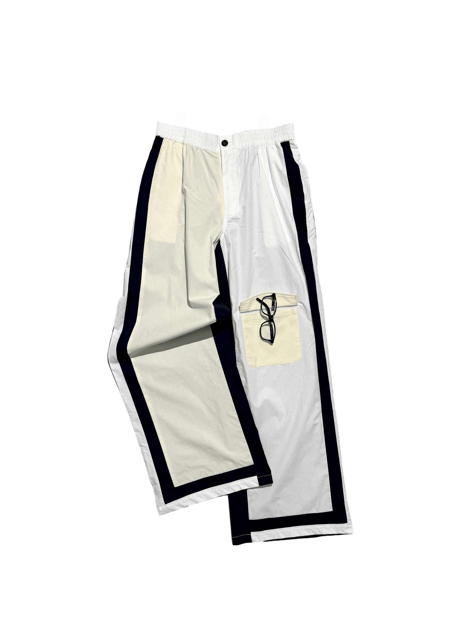 Men's neutral panel poplin trousers with technical utility design.