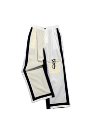 Men's neutral panel poplin trousers with technical utility design.