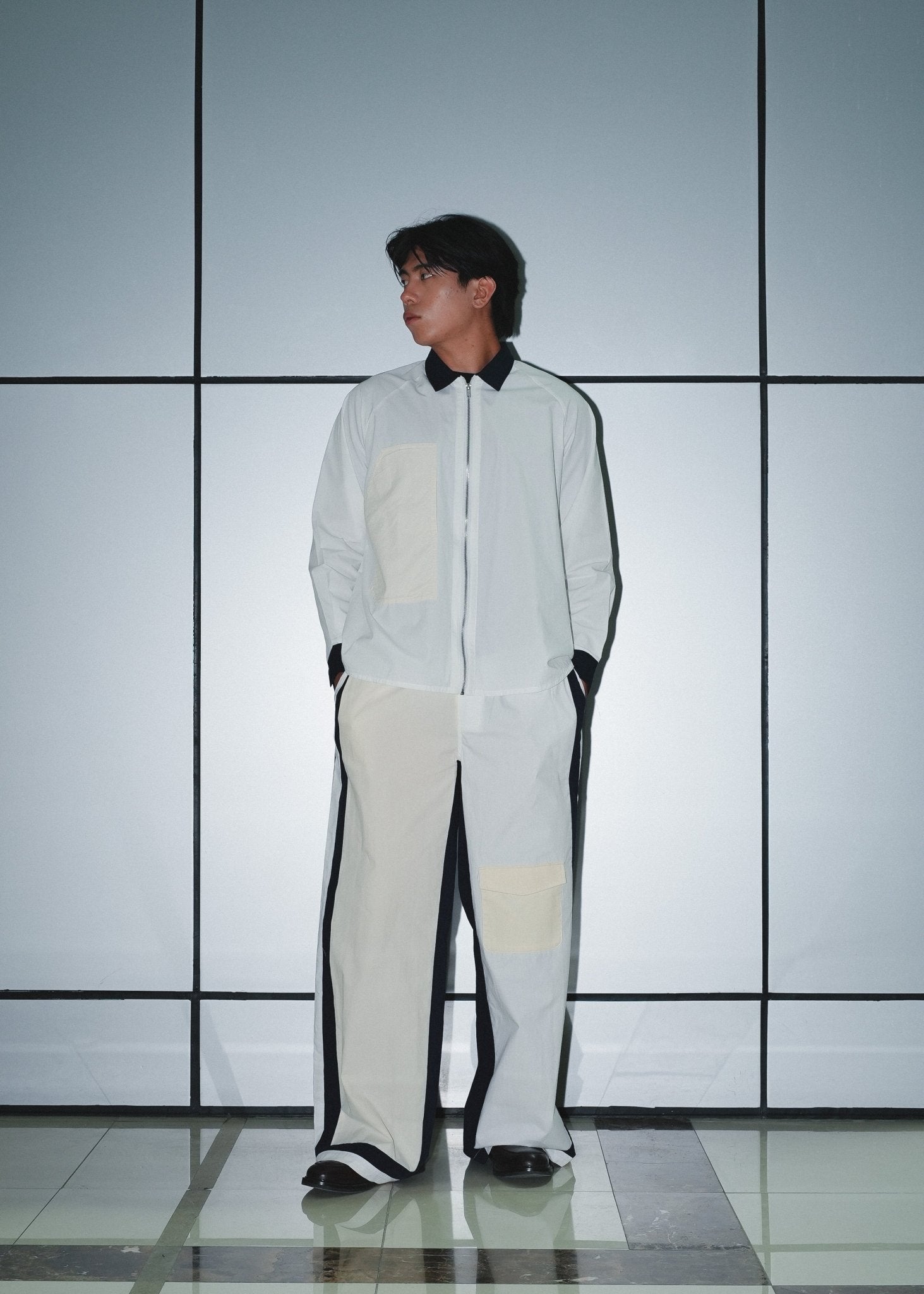 Men's streetwear look featuring the multicolor patch poplin shirt in Dubai.