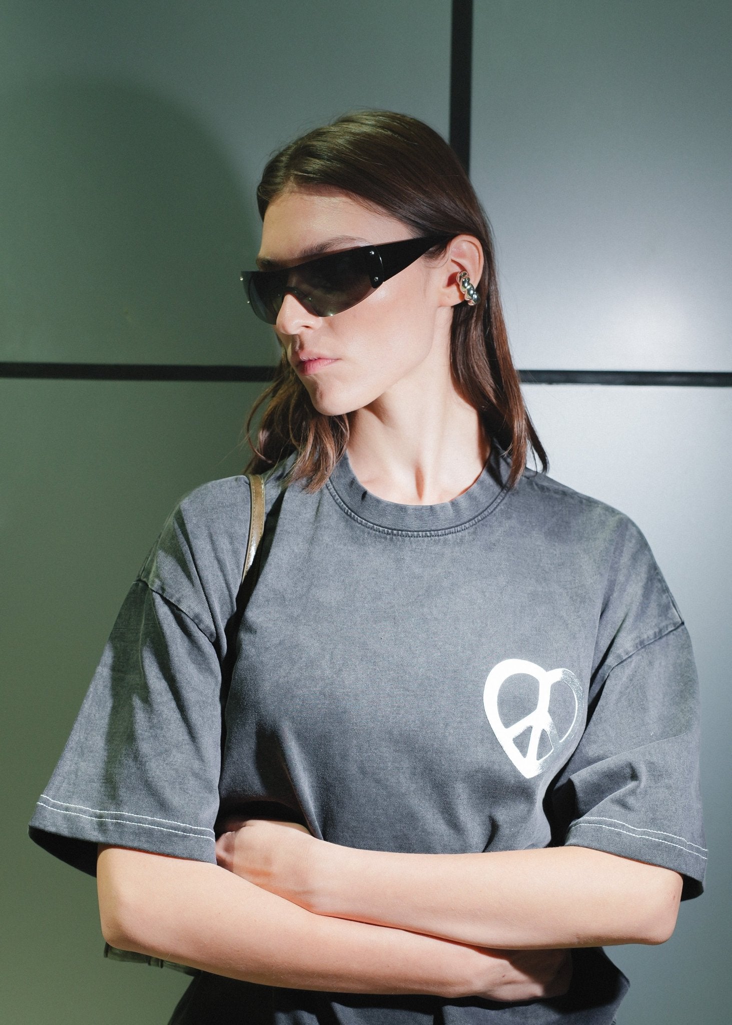 Detailed view of the Peace & Love Oversized graphic tee.