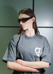 Detailed view of the Peace & Love Oversized graphic tee.