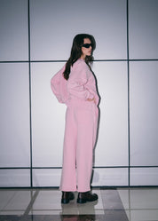Side profile of the Pink Relaxed Sweatpants highlighting the structured baggy fit.
