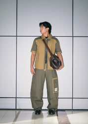 Full streetwear set featuring the two-tone tech zip shirt and matching cargo pants.