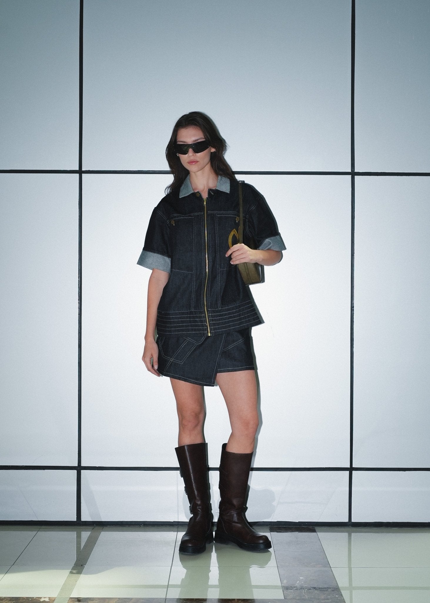 Urban streetwear outfit featuring a Denim short-sleeve shirt and matching mini skirt.