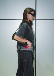 Side profile highlighting the voluminous barrel-leg shape of the Wesley jeans.