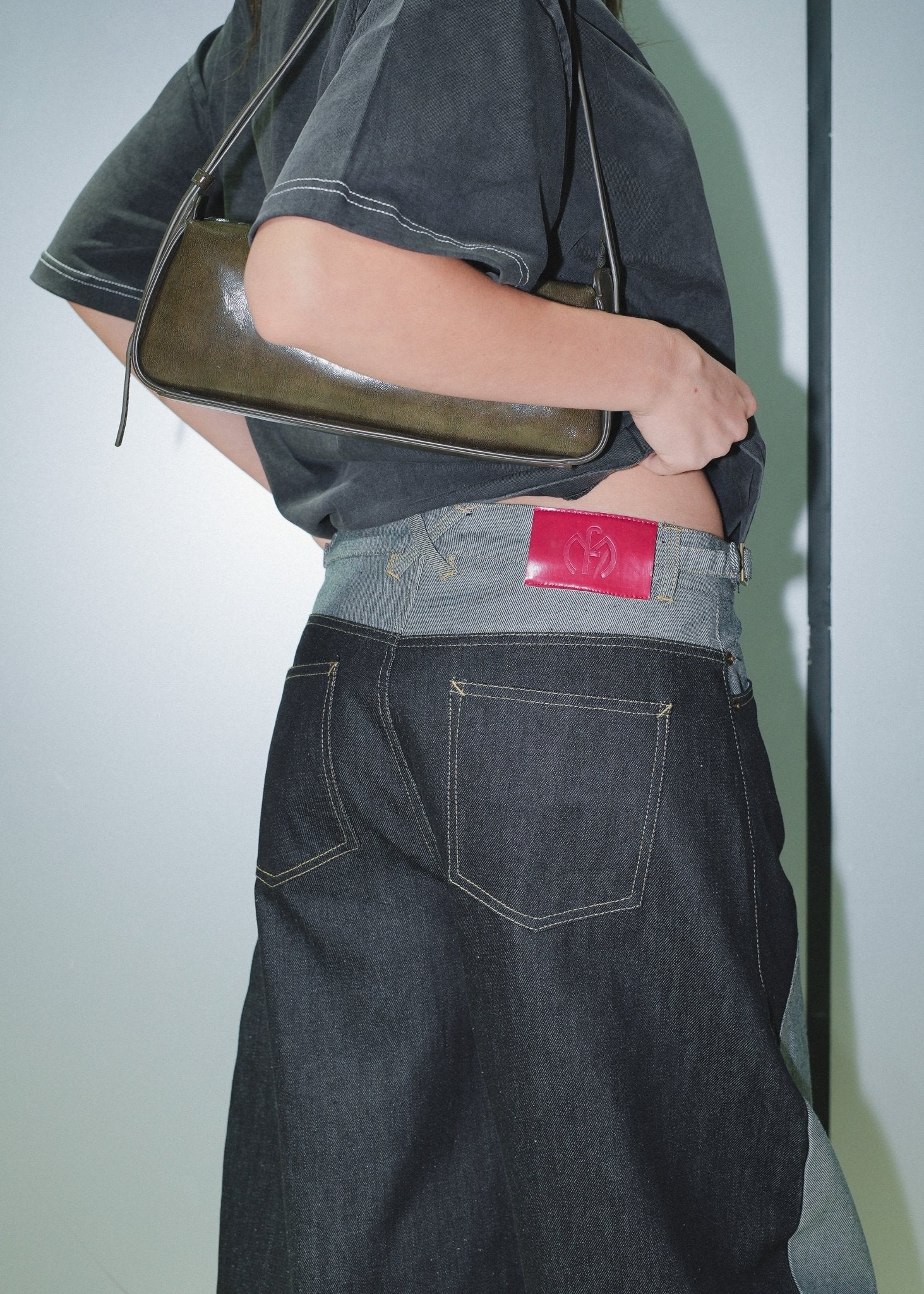 Detailed view of the architectural western yoke panelling on the Wesley denim jeans.
